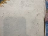 an image of a painting of a woman ' s face on a piece of paper