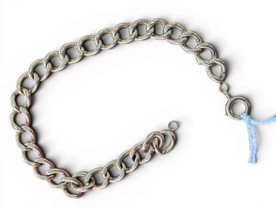 a silver chain with a blue knot on it