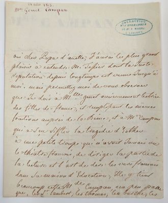 une lettre écrite à l'encre en cursive sur un morceau de papier