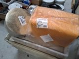 a large piece of orange plastic sitting on top of a box