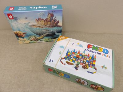 a box of magnetic tiles next to a box of magnetic tiles