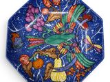an image of a decorative plate with a bird on it