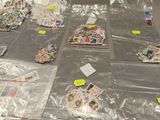 a lot of stamps on the floor of a room
