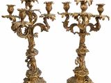 pair of antique brass candelabs with flowers and leaves