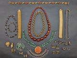 an assortment of jewelry including necklaces, bracelets, and rings