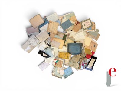 a pile of old papers and other papers on a white surface