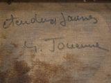 an old book with writing on it sitting on top of a table