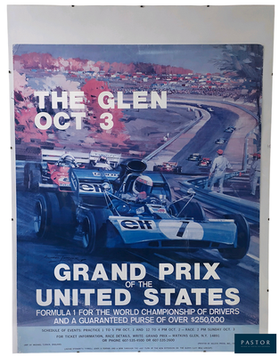 a poster of a grand prix race car on display