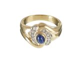 une image d'une bague en or avec une pierre bleue et des diamants