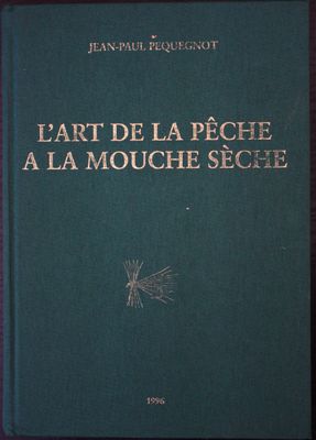 the front cover of a book with gold lettering on it