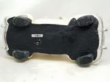 a black and white picture of a skateboard on a white surface