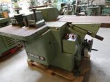 a machine that is sitting on a pallet in a factory