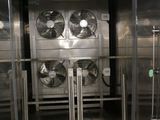 an image of a commercial kitchen with stainless steel appliances