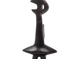 sculpture of a man with a hat on his head on a white background