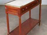 an image of a wooden table with a marble top and two drawers