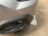 a close up of the front bumper of a car