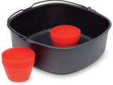 two red cupcake cases in a black pan