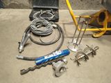 a lot of tools that are laying out on the floor