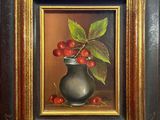 an oil painting of cherries in a black vase with a gold frame