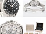 two watches and a watch box on a white background