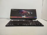 a box with a keyboard and a mouse on the table