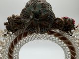 a picture of a hat that is on top of a doily