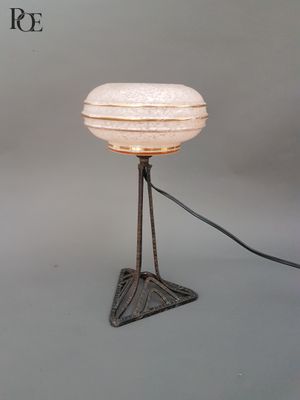 a lamp that is on top of a table