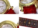 three different shots of a gold watch with a red strap