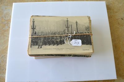 a small book with a tag on it sitting on a piece of paper