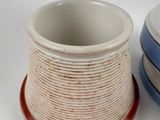 two bowls that are sitting next to each other on a table