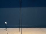 floor lamp in the shape of a lamppost with a red shade