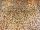 an image of a large oriental rug on a wooden floor