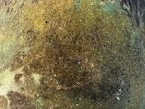a close up of a vase on a table