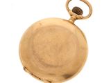 an old gold pocket watch on a white background with a white background