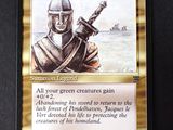 a close up of a card with a picture of a knight holding a sword