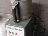 a blender sitting on top of a counter in a kitchen