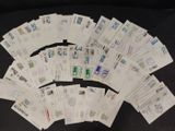 a lot of stamps on a black table top
