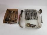 a box of silverware and a box of spoons