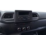 the dashboard of a car with a radio and a steering control