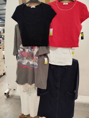 a display of clothes on a rack in a store