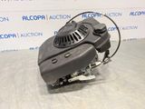 a picture of a car engine with a fan on top of it