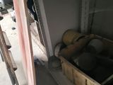 a shelf that has a bunch of items in it