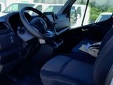 a picture of the inside of a truck with the driver ' s seat up