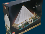 a box that has a lego model of a pyramid in it