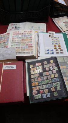 many different types of stamps on the table