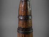 a wooden vase that is sitting on top of a table