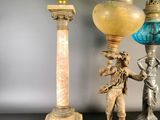 three lamps that are sitting on a table