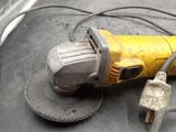 a yellow machine that is sitting on top of a black table