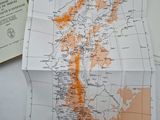 maps of the british and canadian provincess on a table with a book