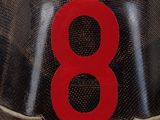 a close up of a hat with the number 8 on it